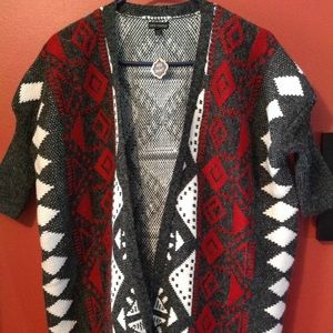 Coco & Carmen poncho sweater